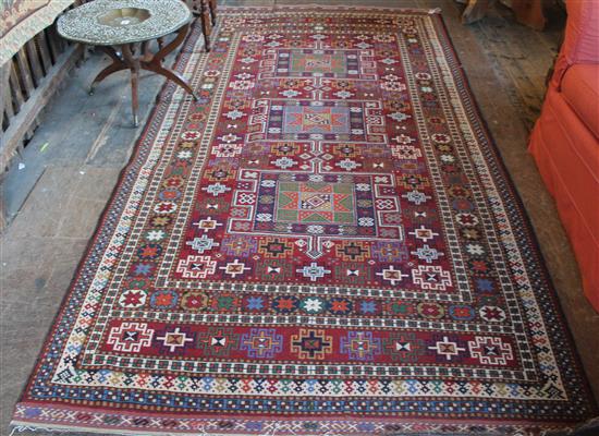 Red & blue Caucasian rug, 10ft by 5ft 1in(-)